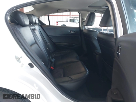 2014 Acura ILX Technology with VIN 19VDE1F73EE005200, listed as a IAAI auction lot 41854914 with 106,929 mi miles and . Bid and sale history available at DreamBid. Image 8.