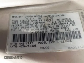 1994 Toyota Camry LE with VIN 4T1SK12E9RU351895, listed as a IAAI auction lot 41239573 with 184,866 mi miles. Bid and sale history available at carsss.com. Image 9.