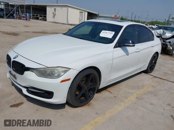 2012 BMW 3 Series 328i with VIN WBA3A5C56CF341495, listed as a IAAI auction lot 42267769 with 224,561 mi miles and . Bid and sale history available at DreamBid. Image 2.