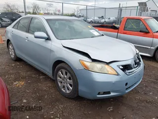 2007 Toyota Camry LE with VIN JTNBK46K873006572, listed as a IAAI auction lot 42083419 with 203,605 mi miles and . Bid and sale history available at DreamBid. Image 1.