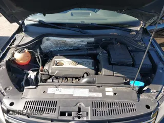 2012 Volkswagen Tiguan LE with VIN WVGAV7AX1CW557250, listed as a IAAI auction lot 42300694 with 122,310 mi miles and . Bid and sale history available at DreamBid. Image 10.