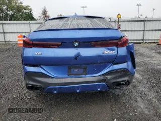 2020 BMW X6 M50i with VIN 5UXCY8C07L9B45473, listed as a Copart auction lot 73403164 with 0 mi miles and Salvage Title. Bid and sale history available at carsss.com. Image 6.