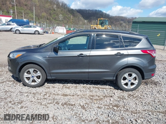 2016 Ford Escape SE with VIN 1FMCU9GX5GUA06660, listed as a IAAI auction lot 42043031 with 87,719 mi miles. Bid and sale history available at carsss.com. Image 14.