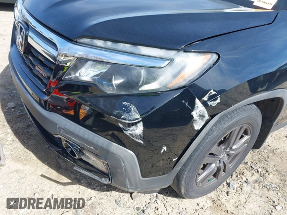 2019 Honda Ridgeline Sport with VIN 5FPYK2F12KB007990, listed as a IAAI auction lot 41828709 with 67,736 mi miles and . Bid and sale history available at DreamBid. Image 17.