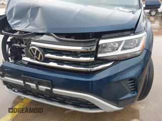 2023 Volkswagen Atlas SE z VIN 1V2WR2CA3PC507742, wystawiony jako IAAI lot #41282782 z przebiegiem 26 052 mil mil oraz . Historia ofert i sprzedaży dostępna na DreamBid. Obrazek 18.