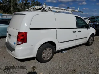 2013 Ram Cargo Van Tradesman with VIN 2C4JRGAGXDR812805, listed as a Copart auction lot 84934214 with 184,209 mi miles and Salvage Title. Bid and sale history available at carsss.com. Image 3.