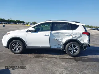 2018 Toyota RAV4 XLE with VIN JTMWFREV3JJ753454, listed as a IAAI auction lot 41775159 with 75,078 mi miles. Bid and sale history available at carsss.com. Image 14.
