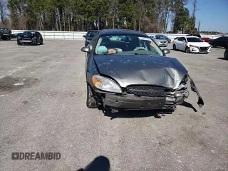 2003 Ford Taurus SEL Deluxe with VIN 1FAFP56S93G222243, listed as a Copart auction lot 46496165 with 193,282 mi miles and Salvage Title. Bid and sale history available at DreamBid. Image 10.