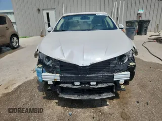 2015 Lincoln MKZ Hybrid z VIN 3LN6L2LU7FR609215, wystawiony jako Copart lot #63211665 z przebiegiem 149 636 mil mil oraz Nie do naprawy • Non repairable. Historia ofert i sprzedaży dostępna na DreamBid. Obrazek 5.