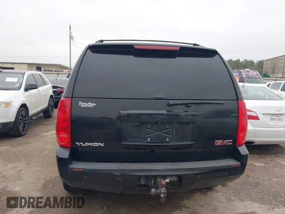 2014 GMC Yukon SLT with VIN 1GKS1CE02ER207447, listed as a IAAI auction lot 41604134 with 199,417 mi miles. Bid and sale history available at carsss.com. Image 16.