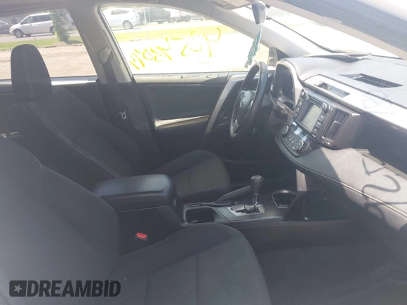 2016 Toyota RAV4 XLE with VIN JTMRFREV0GJ073114, listed as a IAAI auction lot 42548094 with 119,431 mi miles and . Bid and sale history available at DreamBid. Image 5.