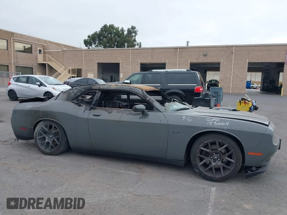 2017 Dodge Challenger R/T Shaker z VIN 2C3CDZBTXHH663987, wystawiony jako IAAI lot #40367339 z przebiegiem Nie podano mil oraz . Historia ofert i sprzedaży dostępna na DreamBid. Obrazek 12.
