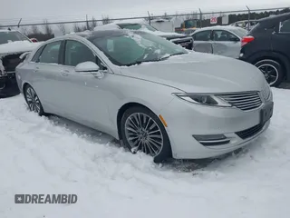 2014 Lincoln MKZ with VIN 3LN6L2JK9ER813109, listed as a IAAI auction lot 41444866 with 128,613 mi miles. Bid and sale history available at carsss.com. Image 1.