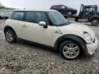 2011 MINI Hardtop S with VIN WMWSV3C56BTY15420, listed as a Copart auction lot 58050875 with 162,145 mi miles and Salvage title. Bid and sale history available at DreamBid. Image 4.