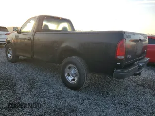 2003 Ford F-150 XL with VIN 1FTRF17W13NA97772, listed as a Copart auction lot 77692074 with Not Provided miles and Salvage Title. Bid and sale history available at DreamBid. Image 2.