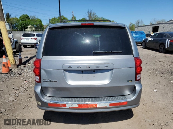 2013 Dodge Grand Caravan SXT with VIN 2C4RDGCG0DR582254, listed as a Copart auction lot 54735205 with 126,071 mi miles and Salvage Title. Bid and sale history available at DreamBid. Image 6.