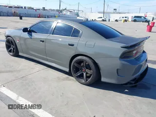 2019 Dodge Charger Scat Pack with VIN 2C3CDXGJ4KH576394, listed as a IAAI auction lot 41846702 with 70,209 mi miles and . Bid and sale history available at DreamBid. Image 3.
