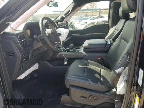 2024 Ford F-150 XLT with VIN 1FTFW3L53RFA12817, listed as a Copart auction lot 50552355 with 5,007 mi miles and Salvage Title. Bid and sale history available at carsss.com. Image 7.