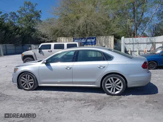 2017 Volkswagen Passat 1.8T SE w/Technology with VIN 1VWGT7A3XHC025096, listed as a IAAI auction lot 41891297 with 124,375 mi miles. Bid and sale history available at carsss.com. Image 14.