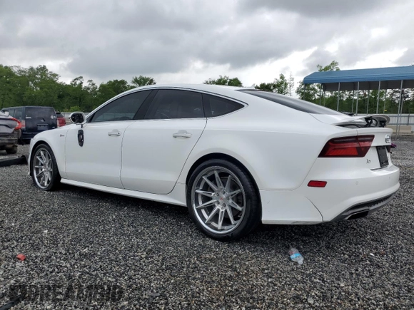 2016 Audi A7 Premium Plus с VIN WAUWGAFC6GN072330, выставлен на аукционе Copart как лот 53941805 с пробегом 169 237 миль миль и Списание • Salvage title. История ставок и продаж доступна на DreamBid. Изображение 2.