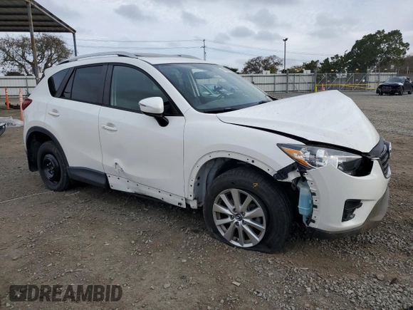 2016 Mazda CX-5 Touring with VIN JM3KE2CY5G0838663, listed as a Copart auction lot 47658065 with 51,470 mi miles and Salvage Title. Bid and sale history available at carsss.com. Image 4.