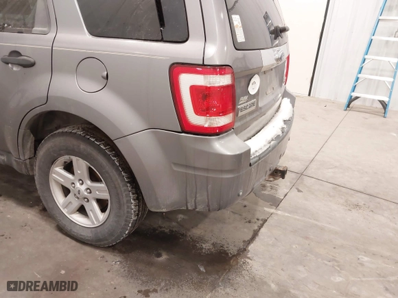 2008 Ford Escape Hybrid with VIN 1FMCU59H18KC30939, listed as a IAAI auction lot 41575587 with 208,879 mi miles. Bid and sale history available at carsss.com. Image 6.