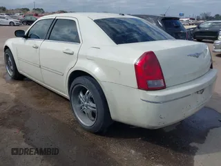 2007 Chrysler 300 Limited with VIN 2C3KA53G77H726475, listed as a IAAI auction lot 41540601 with 167,497 mi miles and . Bid and sale history available at carsss.com. Image 3.