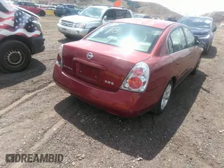 2005 Nissan Altima 2.5 S with VIN 1N4AL11E65N911235, listed as a IAAI auction lot 39269478 with 1 mi miles. Bid and sale history available at carsss.com. Image 4.