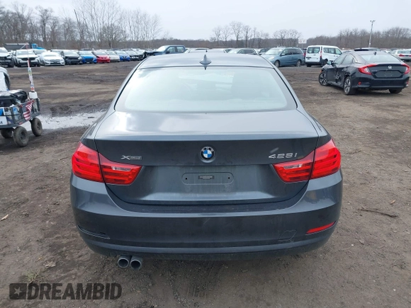 2014 BMW 4 Series 428i xDrive with VIN WBA3N9C50EK246002, listed as a IAAI auction lot 41612256 with 100,915 mi miles and . Bid and sale history available at carsss.com. Image 16.