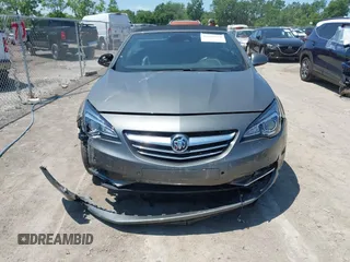 2018 Buick Cascada Premium with VIN W04WH3N50JG051185, listed as a IAAI auction lot 42618570 with 64,216 mi miles and . Bid and sale history available at DreamBid. Image 12.