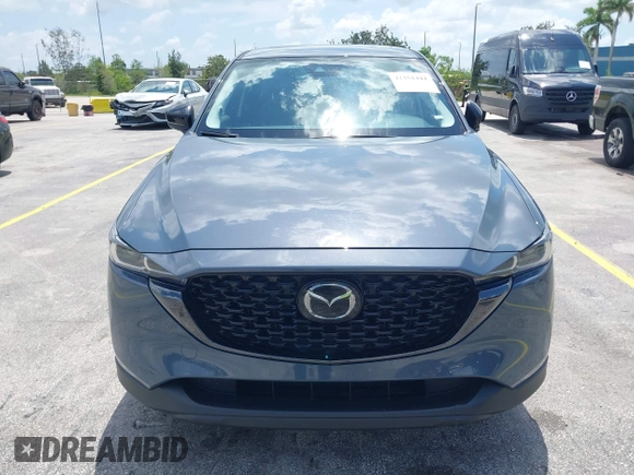 2024 Mazda CX-5 S Carbon Edition z VIN JM3KFBCLXR0521353, wystawiony jako IAAI lot #42351444 z przebiegiem 17 270 mil mil oraz . Historia ofert i sprzedaży dostępna na DreamBid. Obrazek 12.