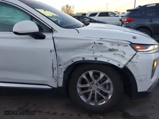 2019 Hyundai Santa Fe SE with VIN 5NMS23AD9KH077362, listed as a IAAI auction lot 41890584 with 132,476 mi miles. Bid and sale history available at carsss.com. Image 6.