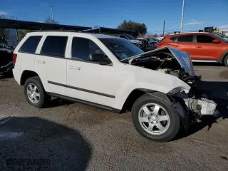 2009 Jeep Grand Cherokee Laredo with VIN 1J8GR48K39C539220, listed as a Copart auction lot 49711345 with 125,505 mi miles and Salvage Title. Bid and sale history available at carsss.com. Image 4.