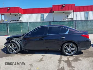 2015 Infiniti Q50 Premium z VIN JN1BV7AR2FM416586, wystawiony jako IAAI lot #41728760 z przebiegiem 138 446 mil mil oraz . Historia ofert i sprzedaży dostępna na DreamBid. Obrazek 15.