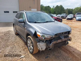 2014 Mitsubishi Outlander SE z VIN 4A4AR4AU7EE028934, wystawiony jako IAAI lot #42003704 z przebiegiem 135 347 mil mil oraz . Historia ofert i sprzedaży dostępna na DreamBid. Obrazek 1.