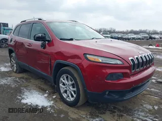 2014 Jeep Cherokee Latitude with VIN 1C4PJMCS2EW175306, listed as a IAAI auction lot 41620115 with 156,578 mi miles and . Bid and sale history available at carsss.com. Image 1.