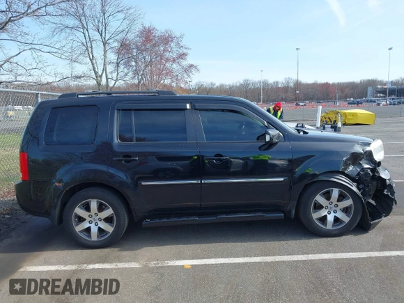 2012 Honda Pilot Touring with VIN 5FNYF4H96CB041380, listed as a IAAI auction lot 41941615 with 137,537 mi miles and . Bid and sale history available at DreamBid. Image 13.