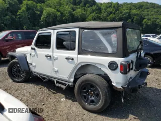 2023 Jeep Wrangler Sport with VIN 1C4HJXDGXPW596127, listed as a Copart auction lot 65395655 with 64,257 mi miles and Salvage title. Bid and sale history available at DreamBid. Image 2.
