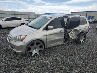 2007 Honda Odyssey Touring with VIN 5FNRL38817B104583, listed as a Copart auction lot 65209915 with 273,507 mi miles and Salvage title. Bid and sale history available at DreamBid. Image 1.