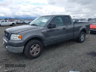 2005 Ford F-150 STX with VIN 1FTRX12W65NA60997, listed as a IAAI auction lot 41836976 with 170,400 mi miles. Bid and sale history available at carsss.com. Image 2.