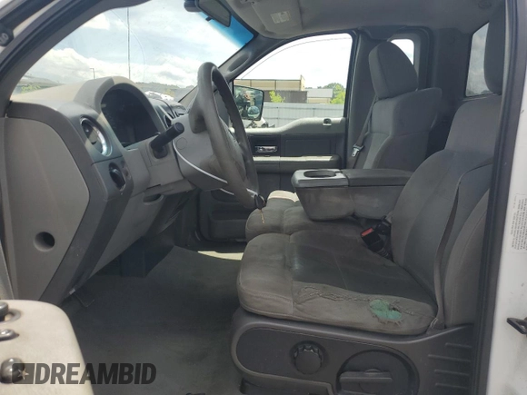 2005 Ford F-150 XL with VIN 1FTVF12585NA40842, listed as a Copart auction lot 61728465 with 288,002 mi miles and Salvage title. Bid and sale history available at DreamBid. Image 7.