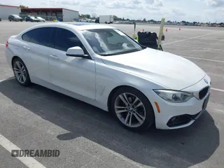 2016 BMW 4 Series 428i with VIN WBA4A9C51GGL88011, listed as a IAAI auction lot 41852057 with 117,669 mi miles. Bid and sale history available at carsss.com. Image 1.