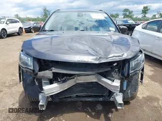 2018 Jeep Compass Latitude with VIN 3C4NJDBB5JT355582, listed as a IAAI auction lot 42351818 with 75,324 mi miles and . Bid and sale history available at DreamBid. Image 13.