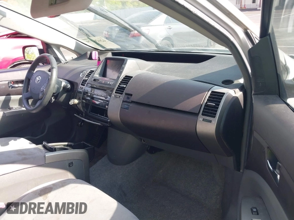 2005 Toyota Prius with VIN JTDKB20U950122932, listed as a IAAI auction lot 42026279 with 153,006 mi miles. Bid and sale history available at carsss.com. Image 5.