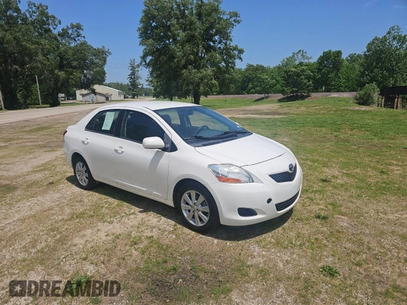 2009 Toyota Yaris z VIN JTDBT903991341371, wystawiony jako Copart lot #57634955 z przebiegiem 205 618 mil mil oraz Tytuł czysty. Historia ofert i sprzedaży dostępna na DreamBid. Obrazek 1.