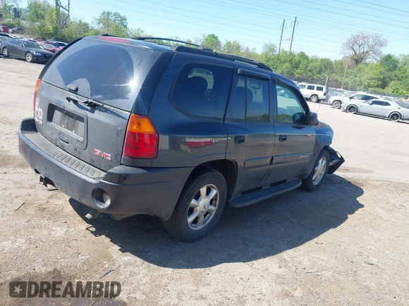 2005 GMC Envoy SLE with VIN 1GKDT13S552253519, listed as a IAAI auction lot 42113617 with 172,058 mi miles and . Bid and sale history available at DreamBid. Image 4.