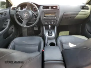 2014 Volkswagen Jetta SE z VIN 3VWD17AJ2EM397825, wystawiony jako Copart lot #64076595 z przebiegiem 61 691 mil mil oraz Szkoda całkowita • Salvage title. Historia ofert i sprzedaży dostępna na DreamBid. Obrazek 8.