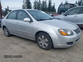 2009 Kia Spectra EX with VIN KNAFE221595659217, listed as a IAAI auction lot 42014406 with 140,527 mi miles. Bid and sale history available at carsss.com. Image 1.