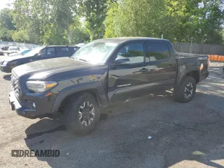 2021 Toyota Tacoma SR z VIN 3TYCZ5AN3MT050456, wystawiony jako Copart lot #56133925 z przebiegiem 104 760 mil mil oraz Szkoda całkowita • Salvage title. Historia ofert i sprzedaży dostępna na DreamBid. Obrazek 1.