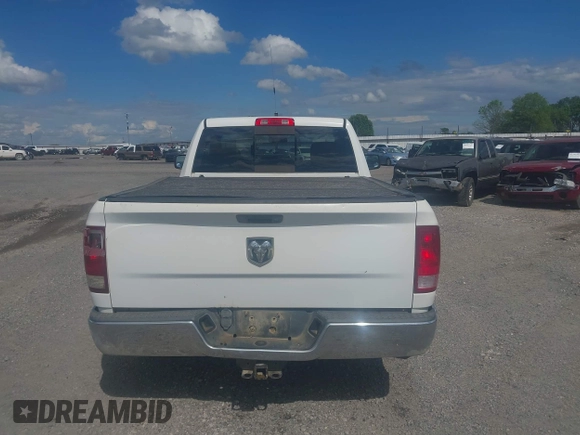 2015 Ram 1500 Tradesman z VIN 3C6JR6AT2FG554433, wystawiony jako IAAI lot #42114470 z przebiegiem Nie podano mil oraz . Historia ofert i sprzedaży dostępna na DreamBid. Obrazek 17.